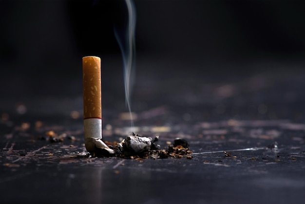 close-up of cigarette smoking outdoors
