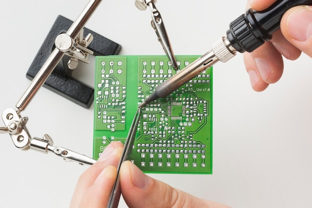 Close-up circuit board repair