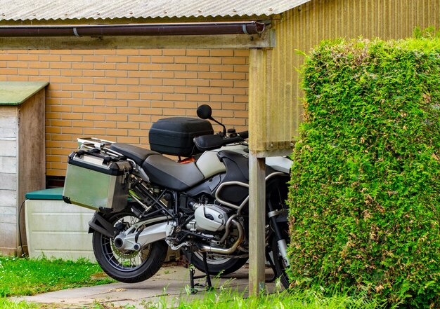 Close up of classic motorcycle on home background.