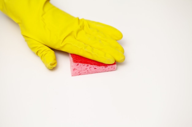 Close Up cleaning company worker hand holding sponge