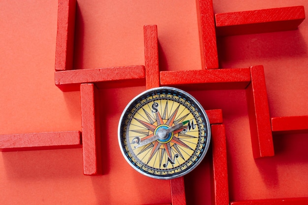 Photo close-up of clock on red wall