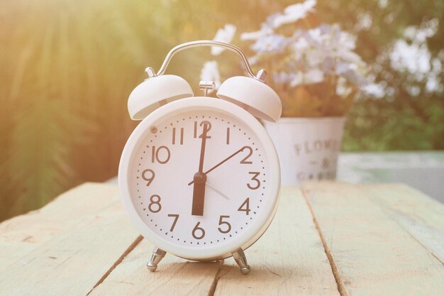 Close-up of clock on table