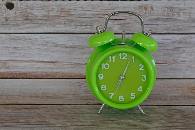 Close-up of clock on table