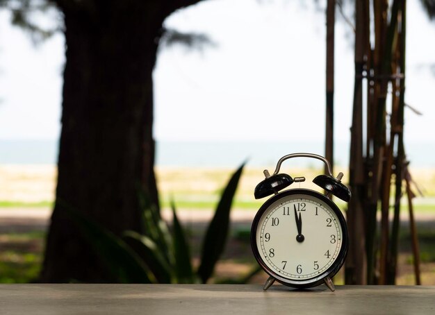 Close-up of clock on table