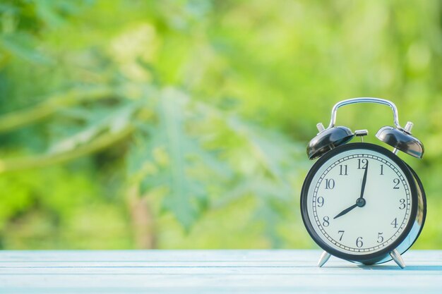 Close-up of clock on table