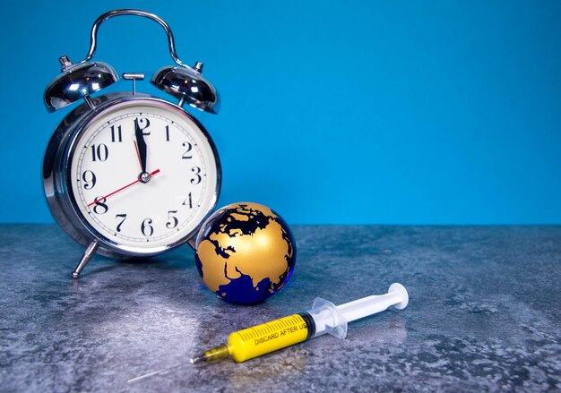 Close-up of clock on table