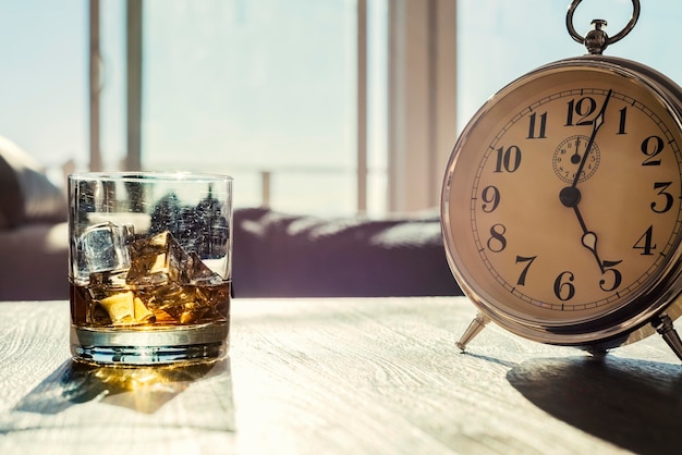 Close-up of clock on table