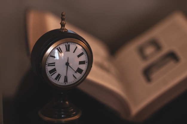 Close-up of clock on table