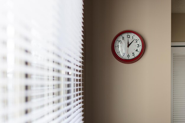 Close-up of clock on wall