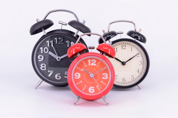 Photo close-up of clock over white background