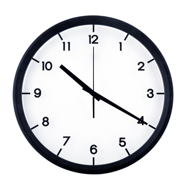 Photo close-up of clock on white background