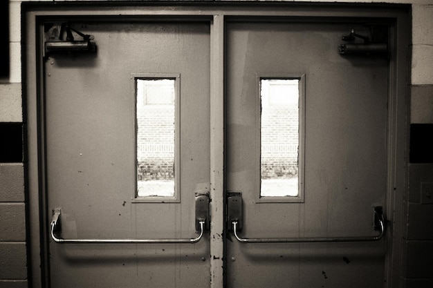 Close-up of closed doors in building