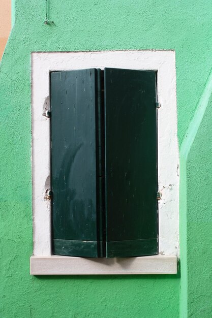 Close-up of closed window of building