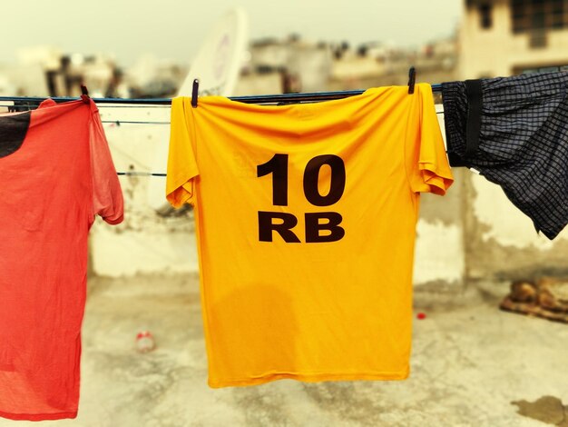 Close-up of clothes drying on clothesline