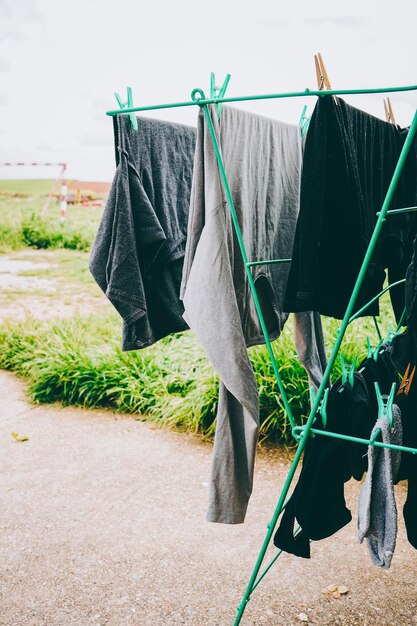 Photo close-up of clothes drying on rope