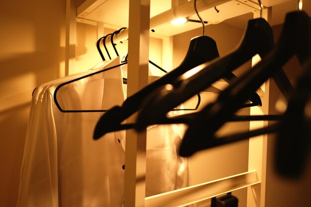 Close-up of clothes hanging on rack