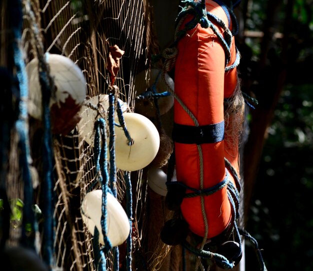 Photo close-up of clothes hanging on rope