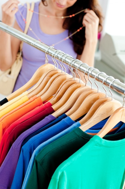 Close-up of clothes with a female customer