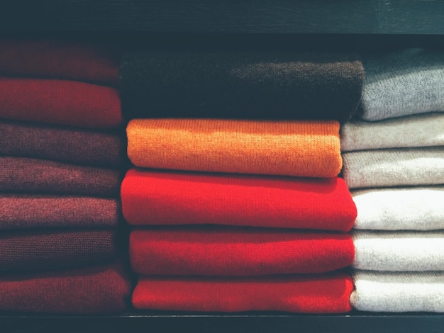 Close-up of clothing stack in wardrobe