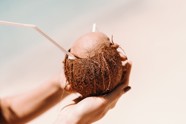 Close up of cocktail in coconut.