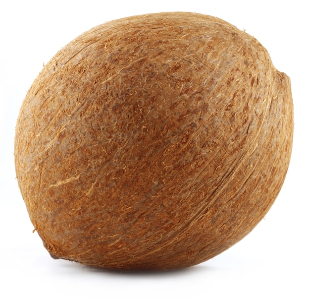 Close up of a coconut over white background