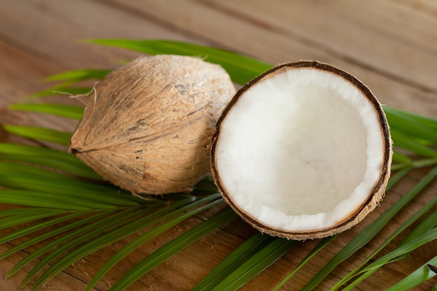 Close up of coconut on wooden