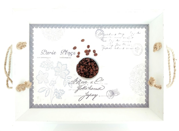 Photo close-up of coffee beans in cup on invitation card