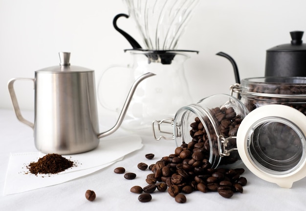 Close-up of coffee beans in jar on table