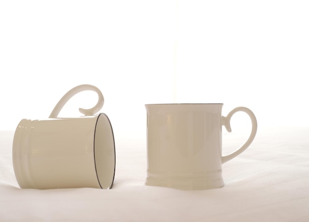 Photo close-up of coffee cup against white background