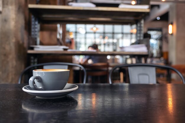 Close-up of coffee cup on table in cafe