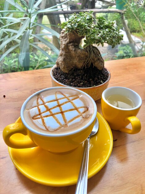 Close-up of coffee in cup on table in cafe