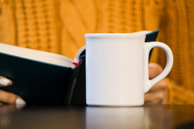 Close-up of coffee cup on table