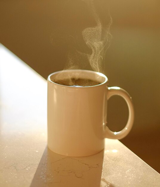 Photo close-up of coffee cup on table