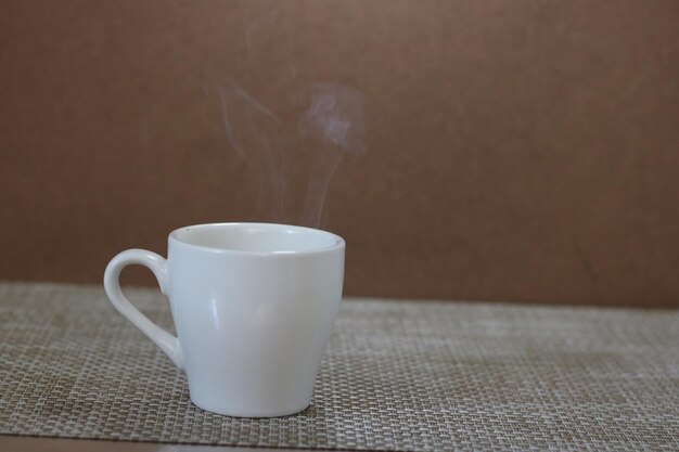 Close-up of coffee cup on table