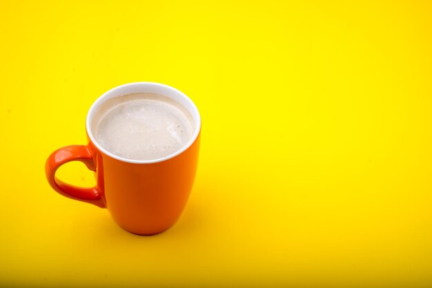 Close-up of coffee cup on table