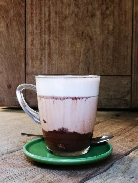 Close-up of coffee cup on table