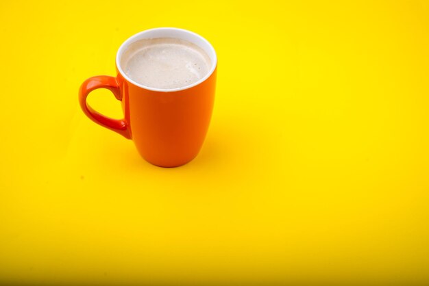 Close-up of coffee cup on table