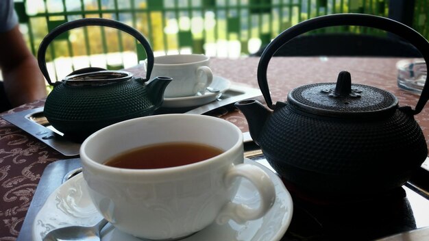 Close-up of coffee cup on table