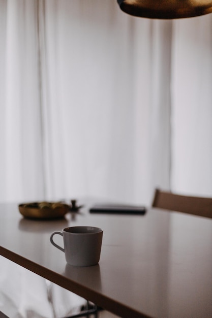 close-up of coffee cup on table