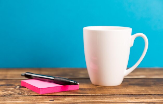 Close-up of coffee cup on table