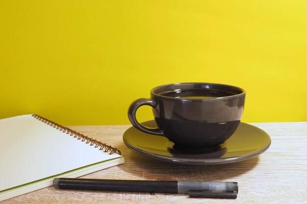 Close-up of coffee cup on table