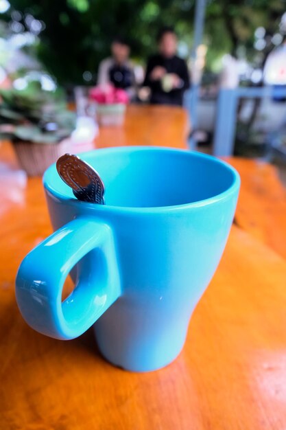 Close-up of coffee cup on table