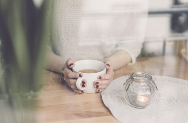 Close-up of coffee cup on table