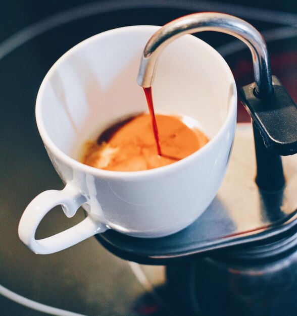 Close-up of coffee cup on table