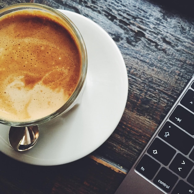 Close-up of coffee cup on table