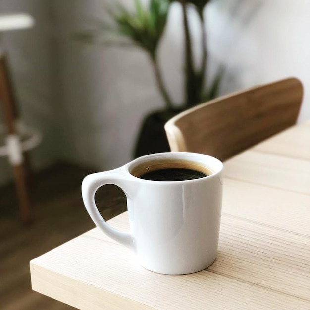 Photo close-up of coffee cup on table