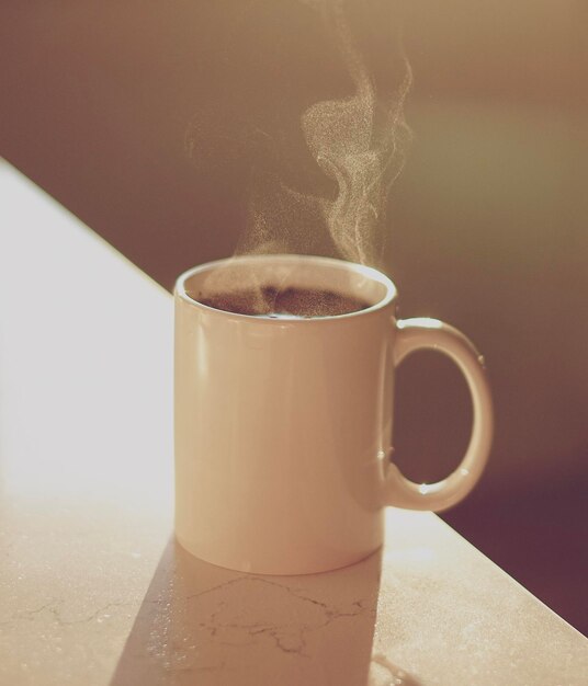 Photo close-up of coffee cup on table