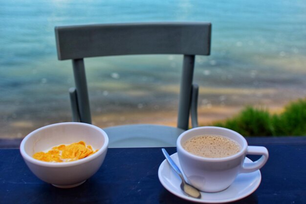 Close-up of coffee cup on table