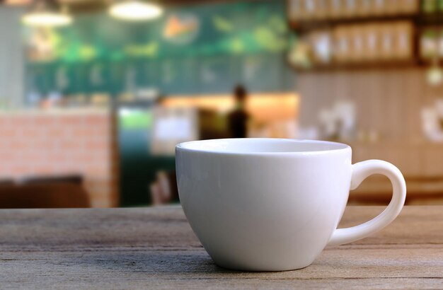 Close-up of coffee cup on table