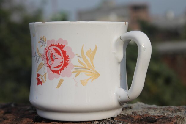 Photo close-up of coffee cup on wall